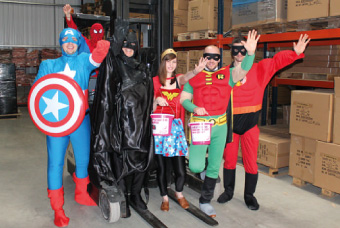 Fastwarm team dressed as super heroes for little havens childrens hospice